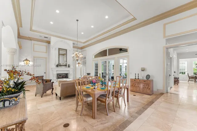 a view of a dining room with furniture window and outdoor view