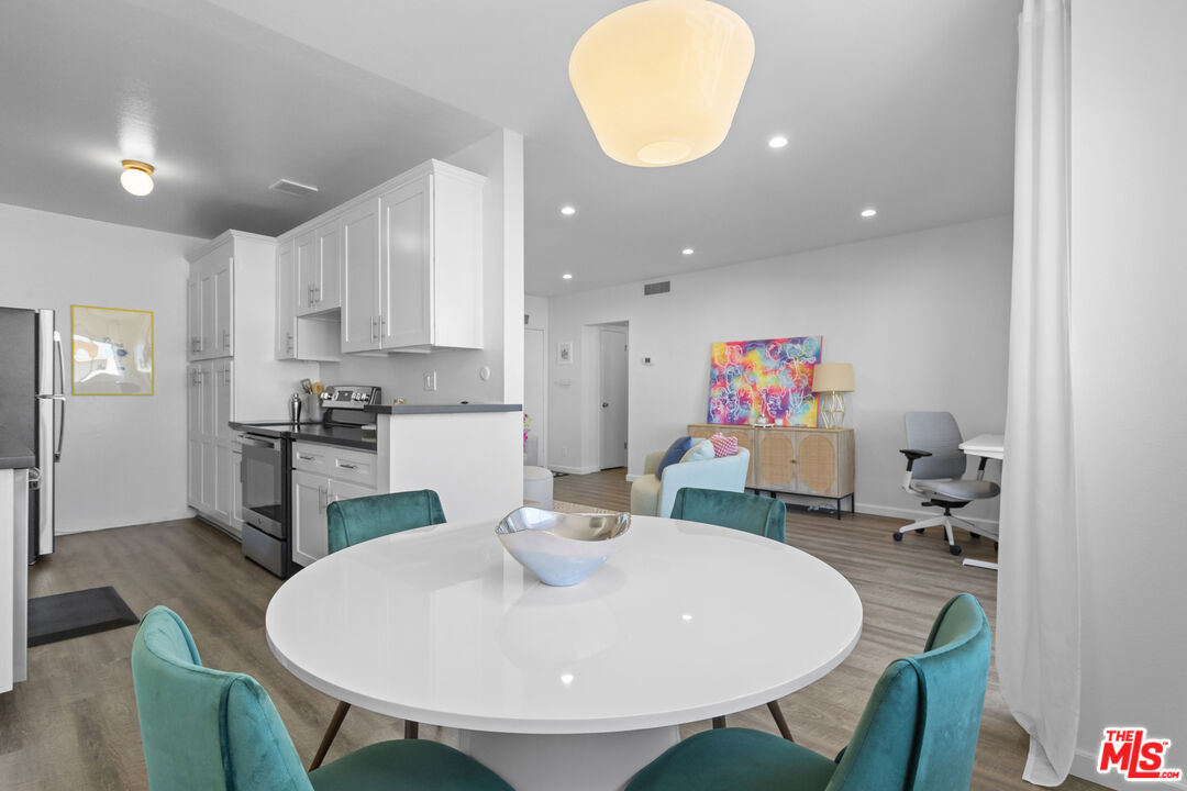 5414 Newcastle Avenue, Unit 50 Encino, CA 91316 - Photo 1 of 23 a view of kitchen with breakfast area