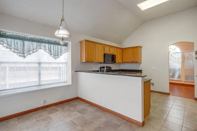 a view of kitchen and window