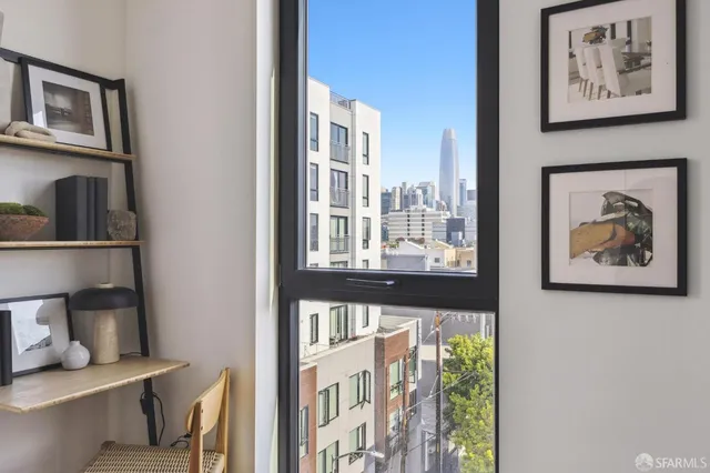 a painting on a wall next to a window