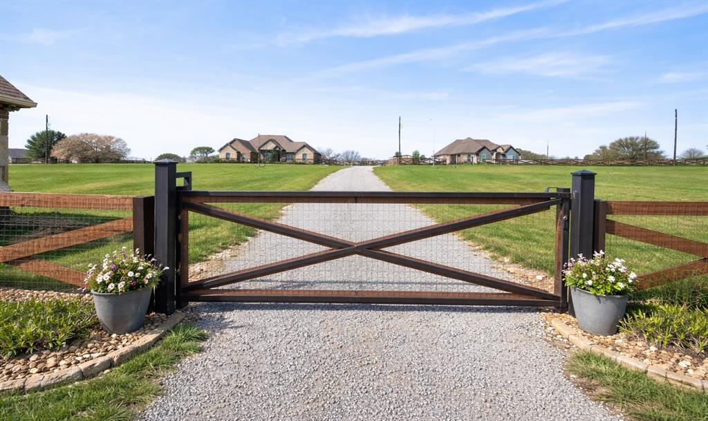 7613 Carter Ranch Road Azle, TX 76020 - Photo 26 of 37 2nd driveway and gate to backyard! Virtually staged.