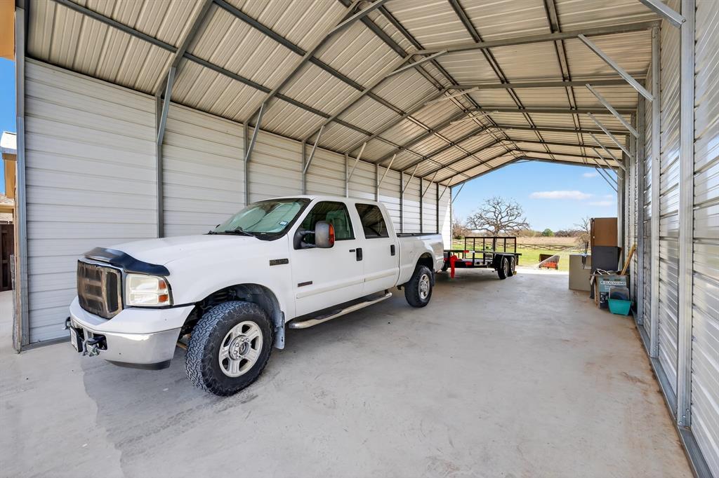 7613 Carter Ranch Road Azle, TX 76020 - Photo 28 of 37 RV storage with electric.