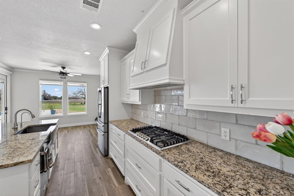 7613 Carter Ranch Road Azle, TX 76020 - Photo 7 of 37 Lots of counter top space for meal prep.