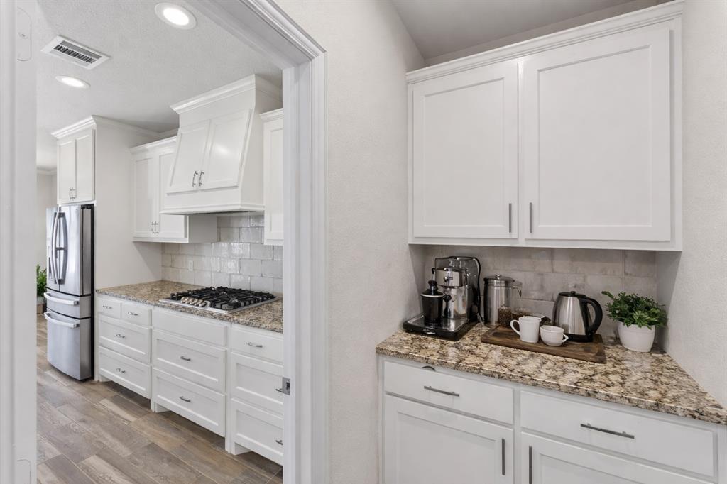 7613 Carter Ranch Road Azle, TX 76020 - Photo 8 of 37 Separate coffee bar in pantry. Virtually staged.