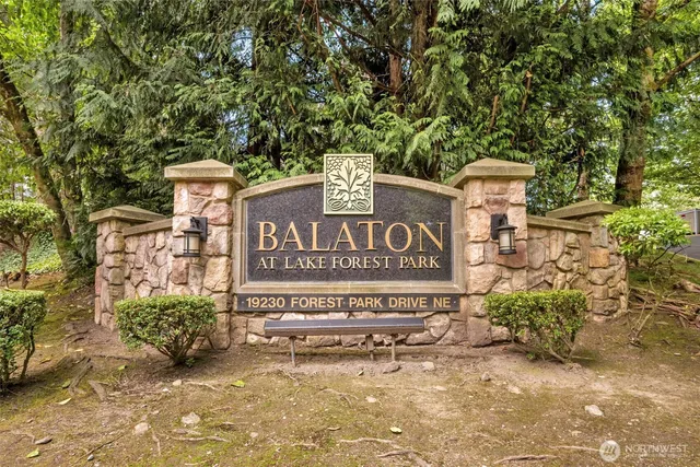 a view of outdoor space with signage and flags