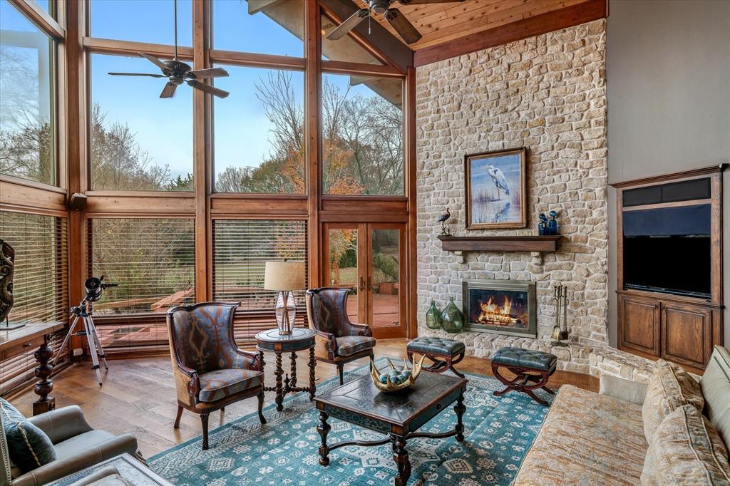 361 Fm 3227 Canton, TX 75103 - Photo 14 of 30 a living room with furniture a flat screen tv and a fireplace