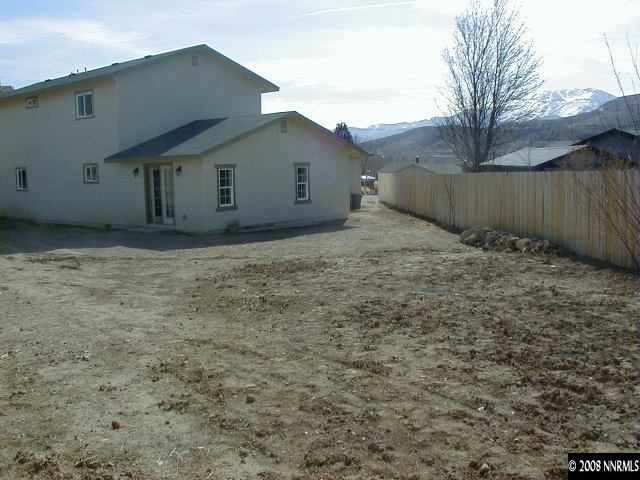 16035 Tourmaline Drive Reno, NV 89521 - Photo 3 of 9 a house view with a backyard space
