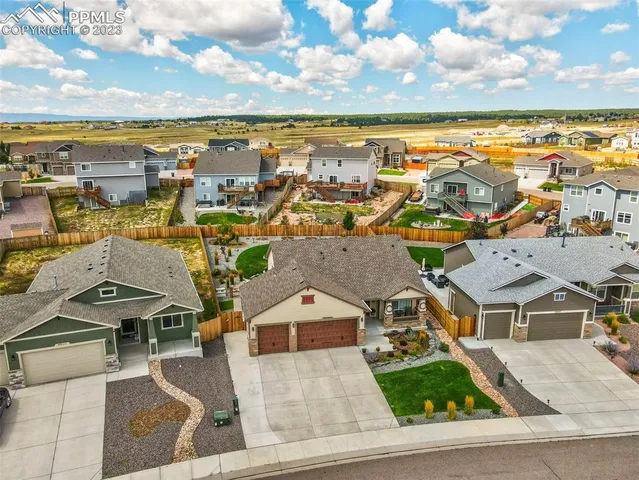 a view of a city with an ocean view