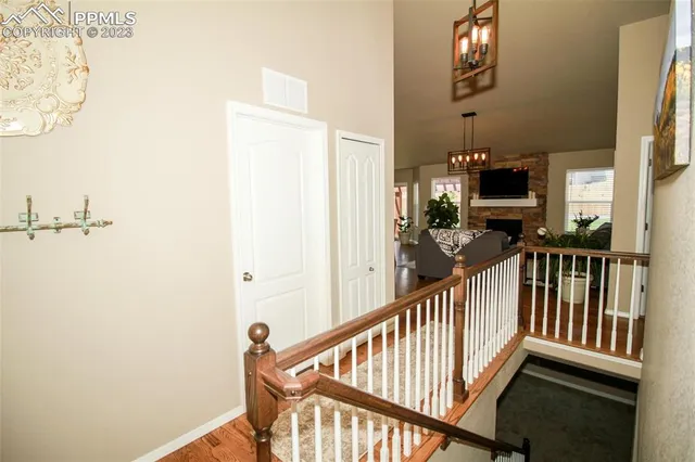 a view of a balcony with furniture