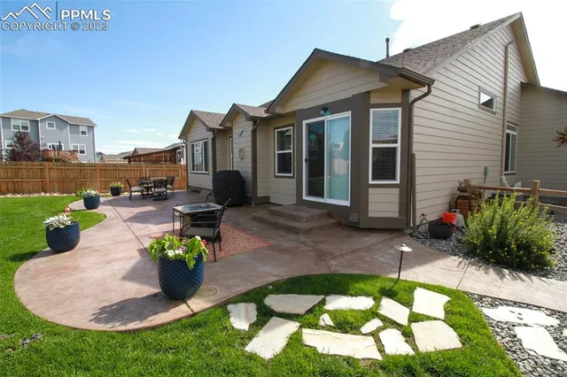 a front view of a house with a patio