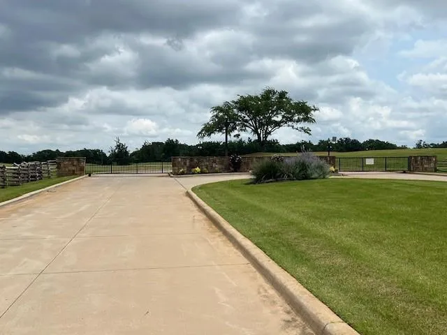 a view of a lake with a big yard