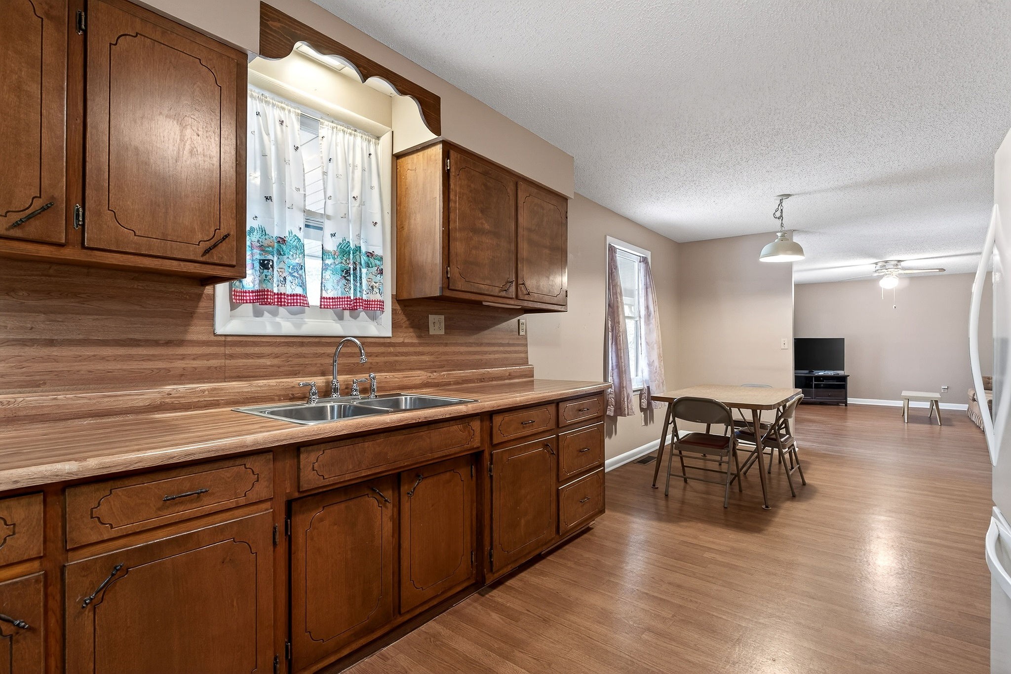 131 Poplar Springs Road Cookeville, TN 38506 - Photo 11 of 50 a kitchen with lots of counter top space and dining table