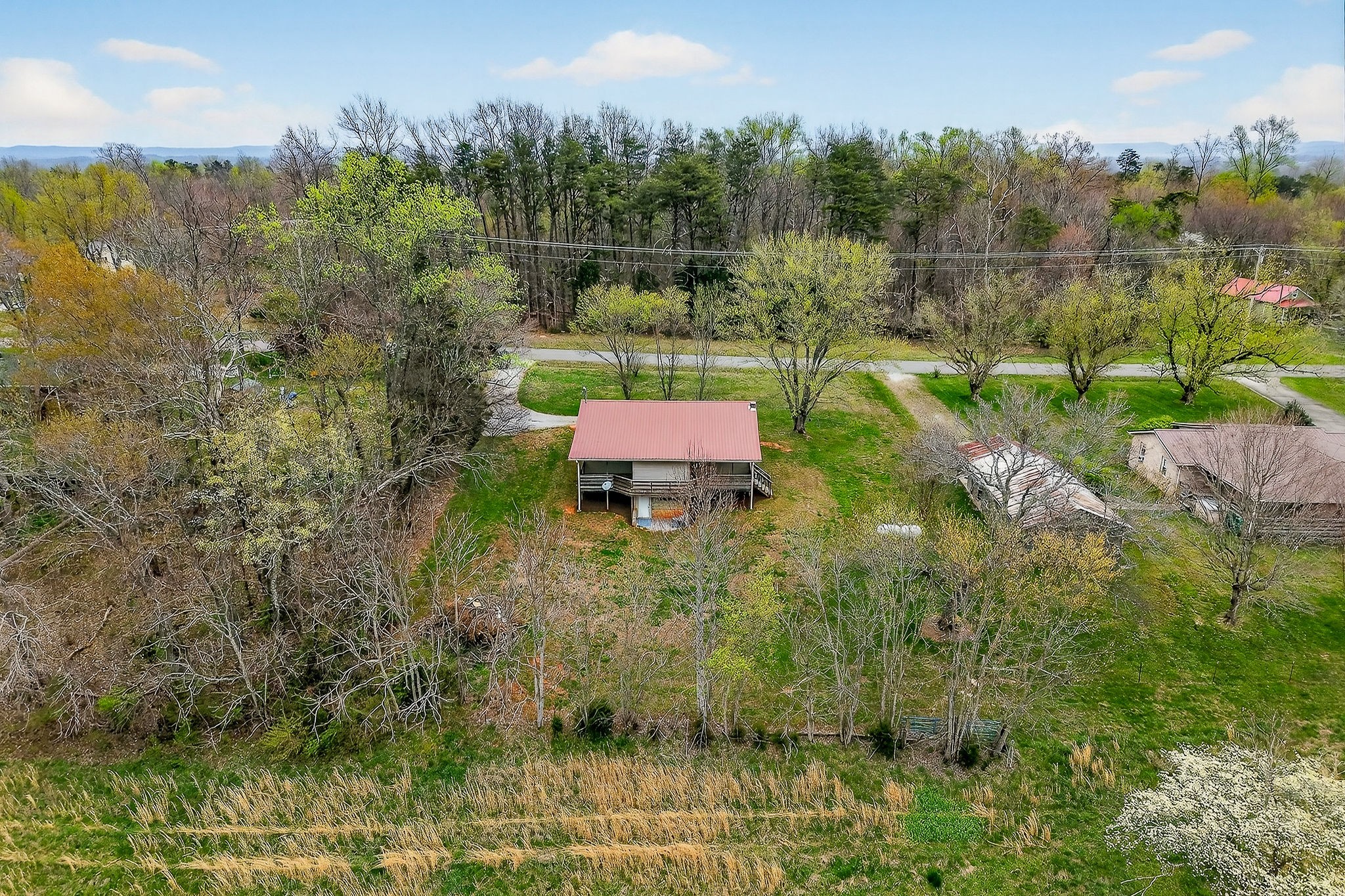 131 Poplar Springs Road Cookeville, TN 38506 - Photo 2 of 50 a view of a yard with table and chairs