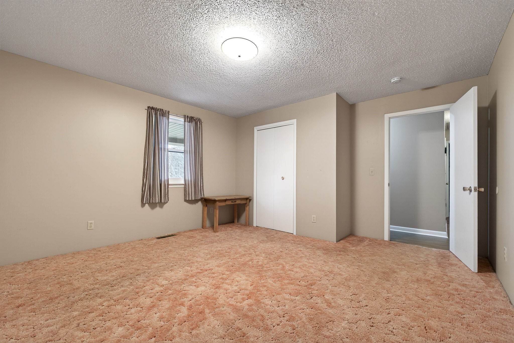 131 Poplar Springs Road Cookeville, TN 38506 - Photo 22 of 50 a view of an empty room with a window