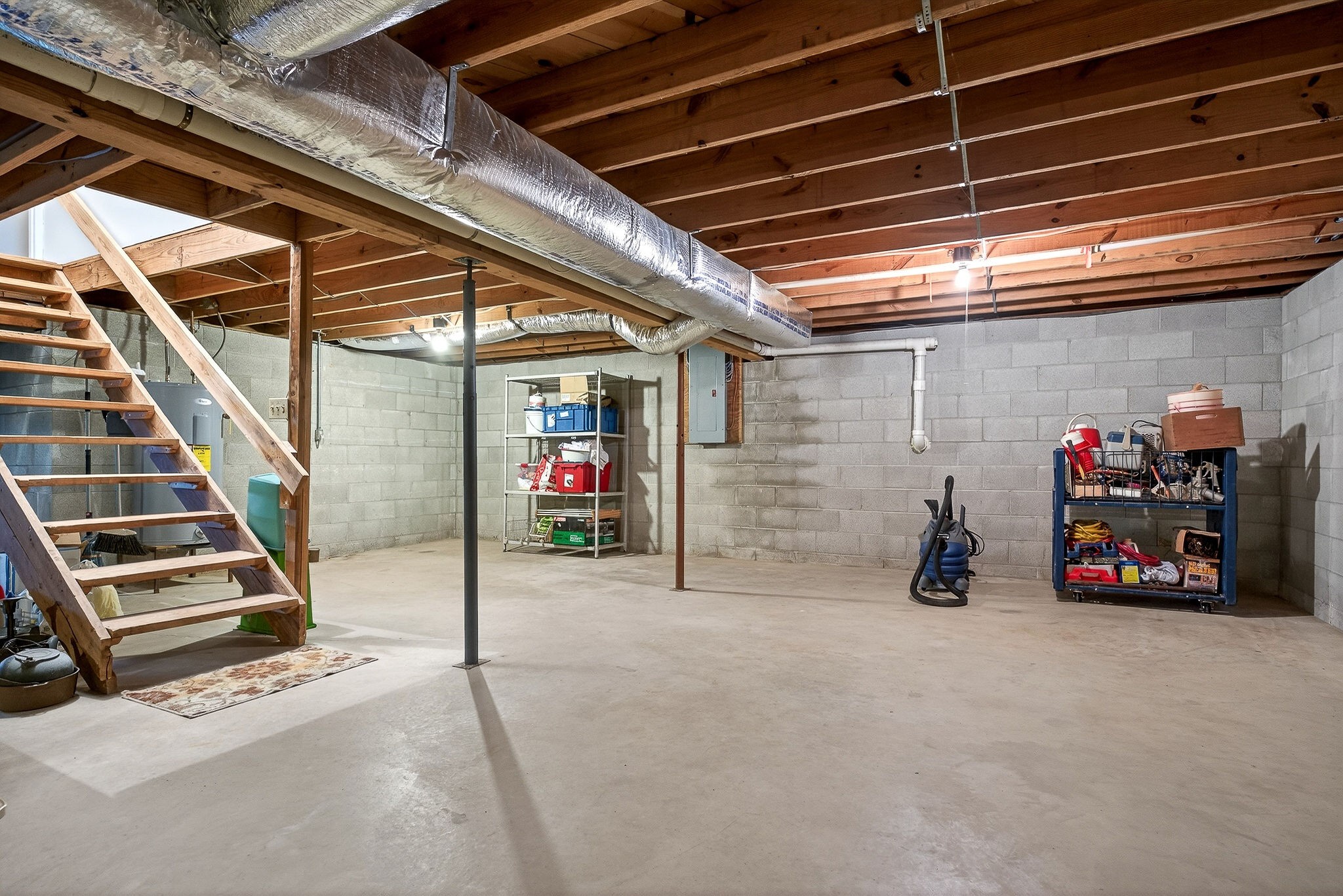 131 Poplar Springs Road Cookeville, TN 38506 - Photo 28 of 50 a view of a garage with a bike and white roof
