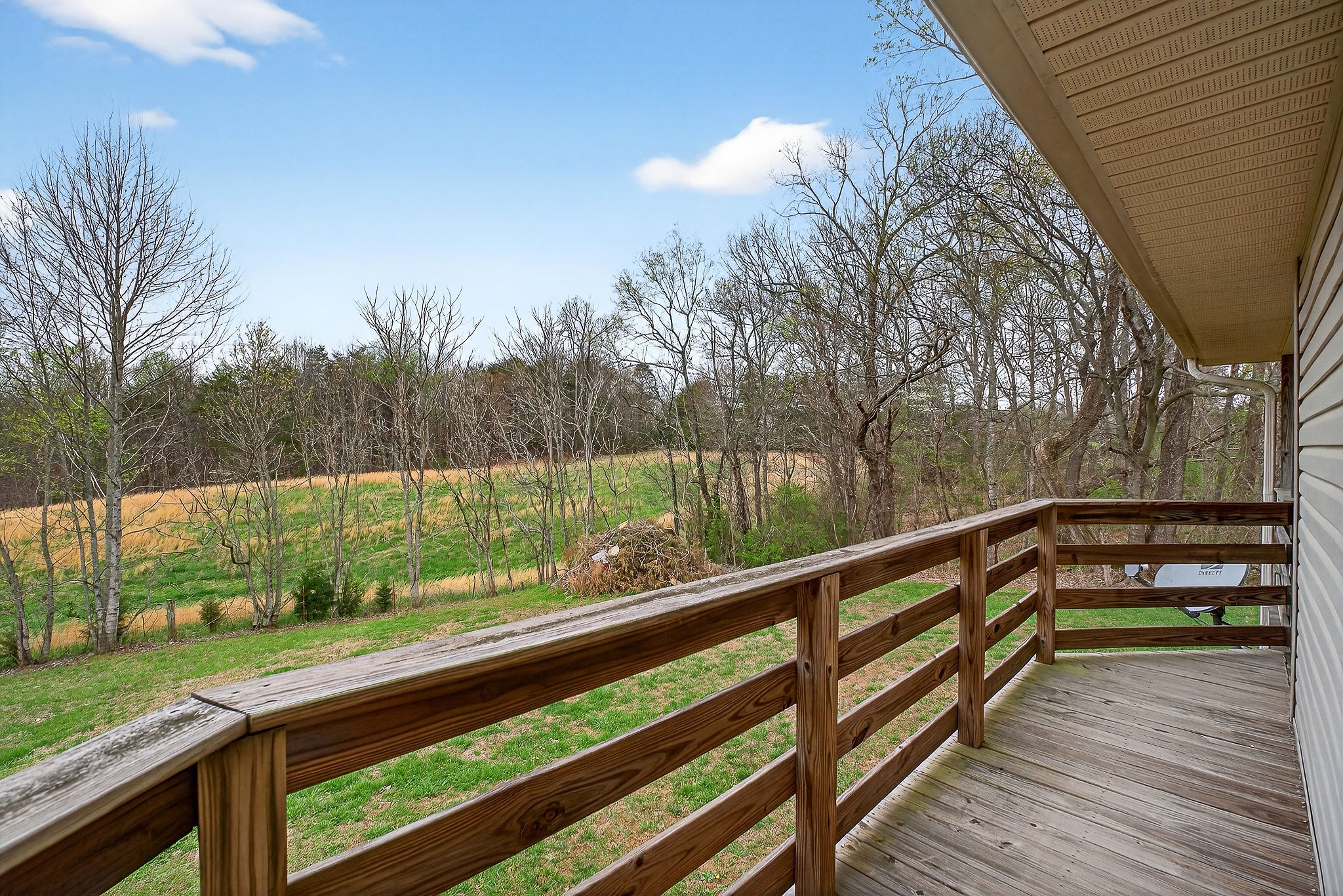 131 Poplar Springs Road Cookeville, TN 38506 - Photo 34 of 50 a view of a deck with mountain view and wooden floor
