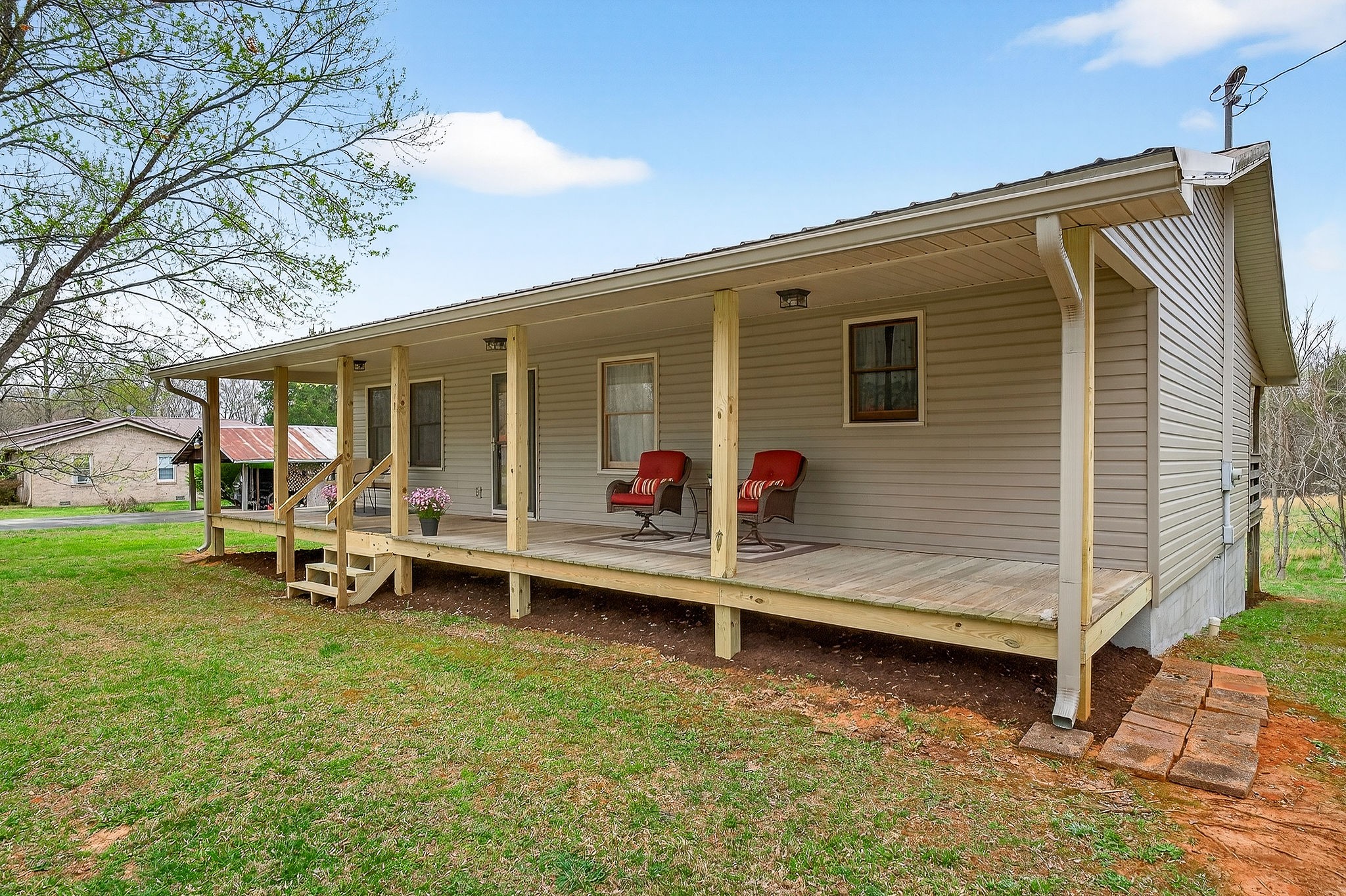 131 Poplar Springs Road Cookeville, TN 38506 - Photo 40 of 50 a view of a house with a yard and sitting area