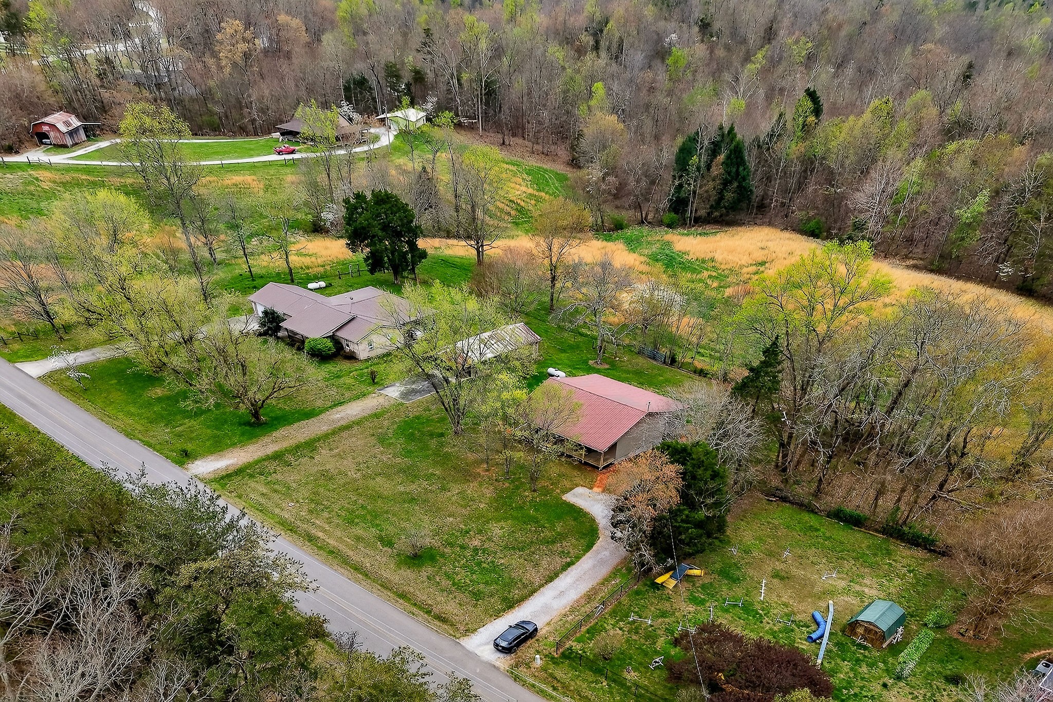 131 Poplar Springs Road Cookeville, TN 38506 - Photo 42 of 50 a view of a garden with a lake