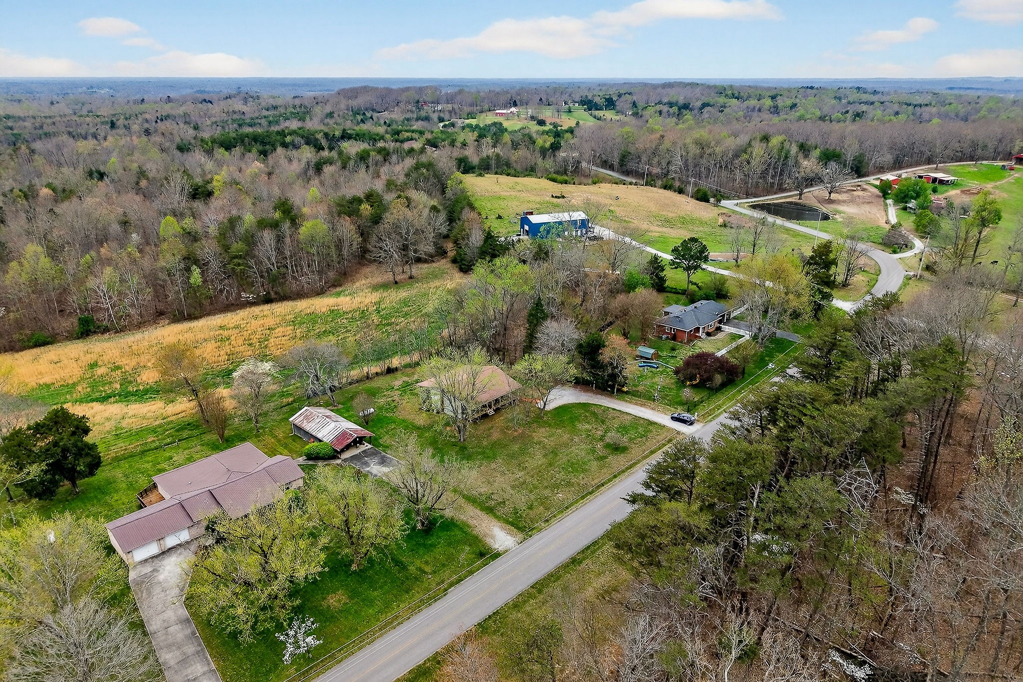 131 Poplar Springs Road Cookeville, TN 38506 - Photo 43 of 50 a view of a garden with an outdoor seating