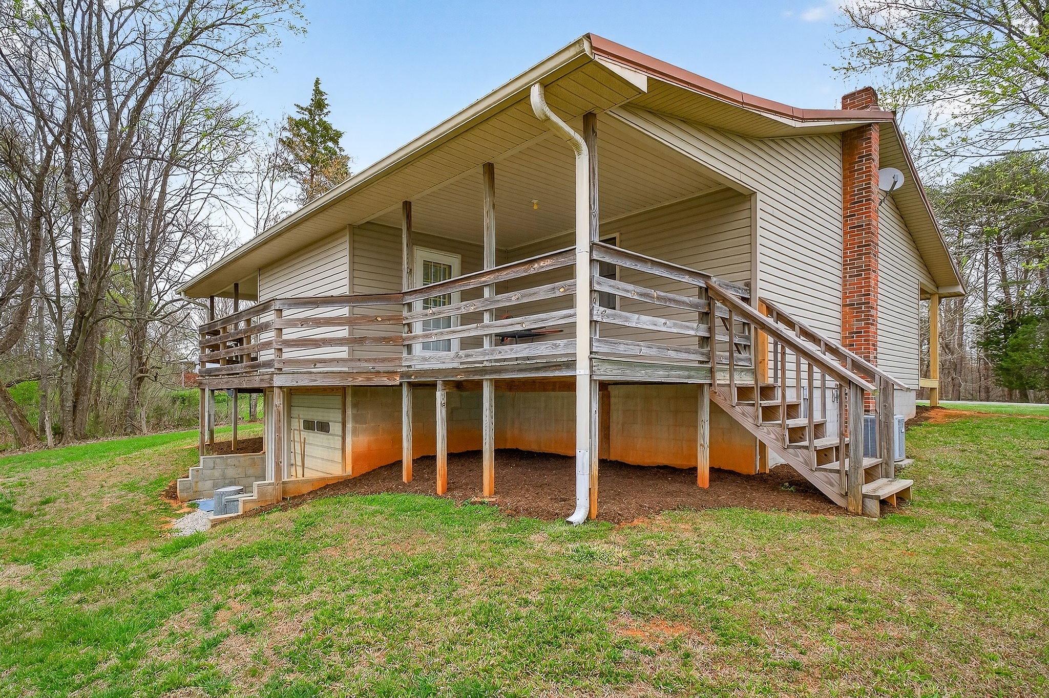131 Poplar Springs Road Cookeville, TN 38506 - Photo 45 of 50 a view of a house with a yard