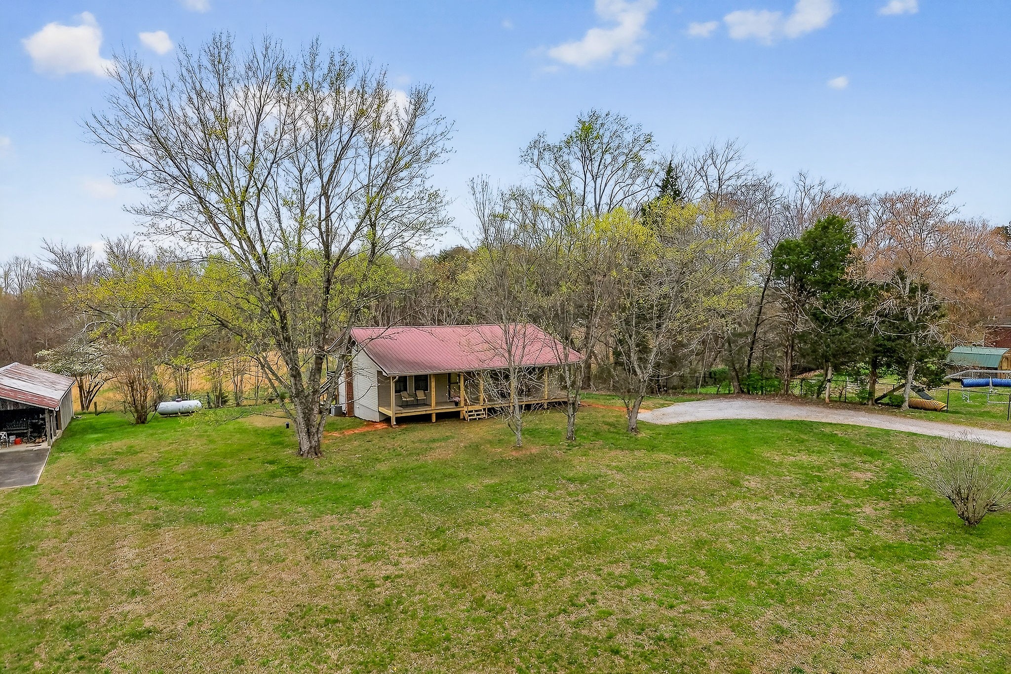 131 Poplar Springs Road Cookeville, TN 38506 - Photo 5 of 50 a view of a house with a yard