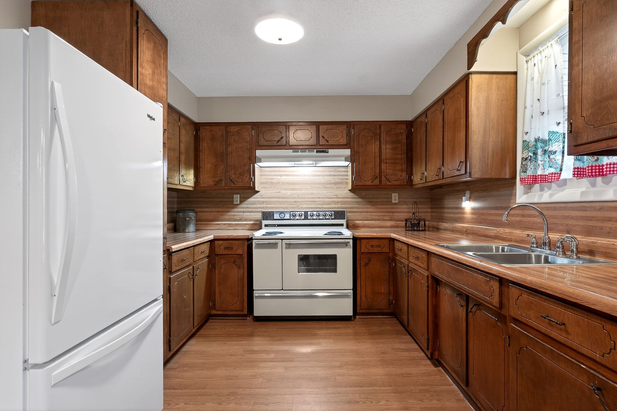 131 Poplar Springs Road Cookeville, TN 38506 - Photo 9 of 50 a kitchen with a stove cabinets and sink