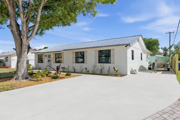 a front view of a house with a patio