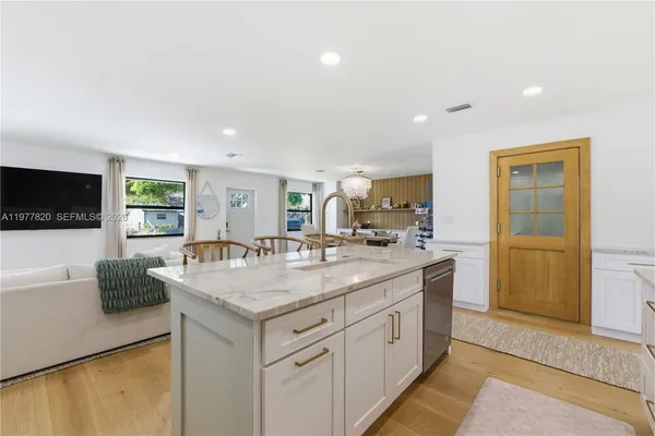 a view of living room with granite countertop furniture and fireplace