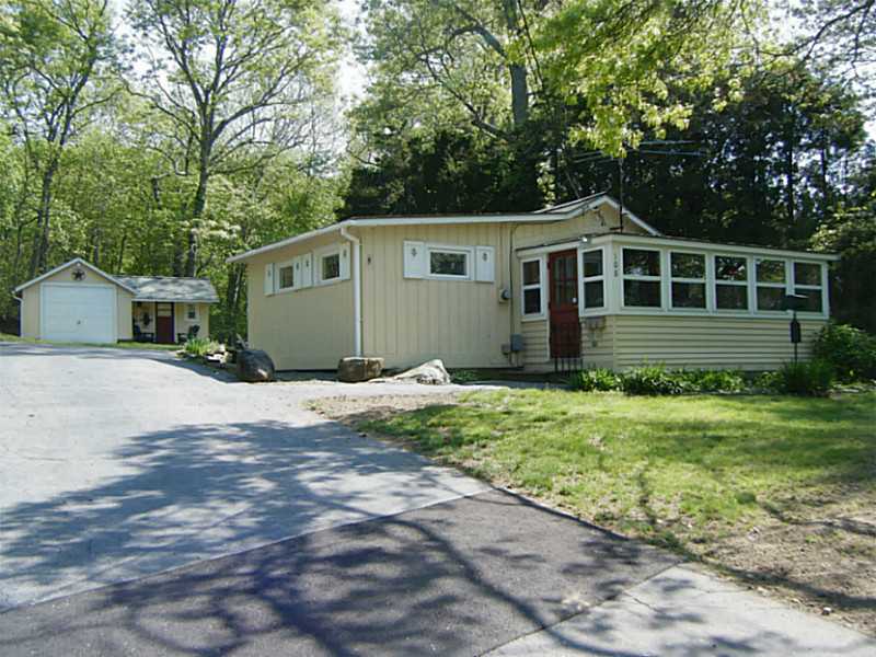 108 Sanctuary Road Charlestown, RI 02813 - Photo 1 of 23 Exterior Front. Adorable Cottage on Watchaug Pond. Outbuilding/Garage for storage for toys for all seasons.