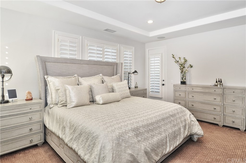 21 Catania Newport Coast, CA 92657 - Photo 20 of 31 a bedroom with a bed and a dresser