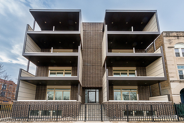 2835 West Division Street, Unit 3E Chicago, IL 60622 - Photo 1 of 25 a picture of a park with many windows