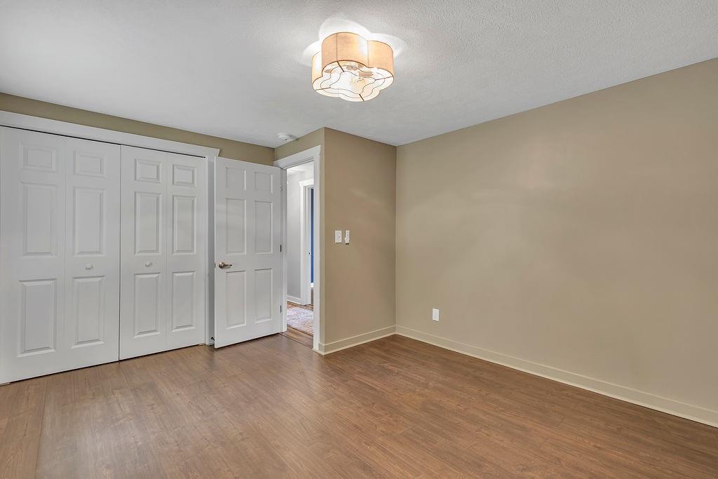 4173 River Road Beaver Falls, PA 15010 - Photo 18 of 33 Master bedroom featuring large space and closets