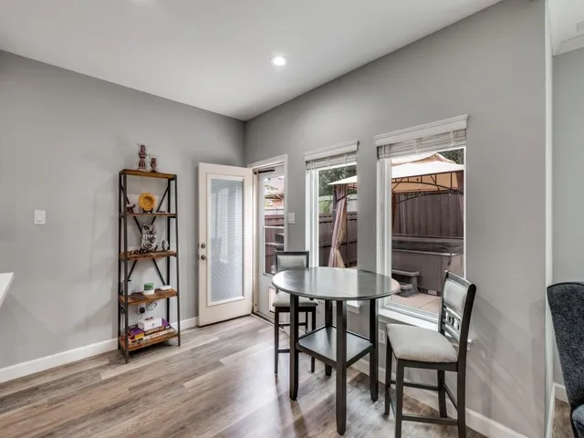 a kitchen with stainless steel appliances granite countertop a refrigerator sink and cabinets