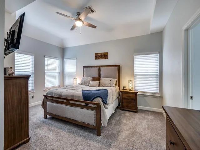 a view of a livingroom with furniture and wooden floor