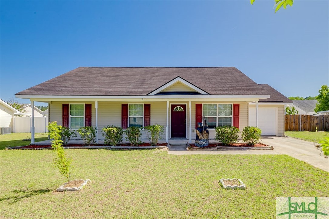 208 Kelly Avenue Rincon, GA 31326 - Photo 1 of 31 Front