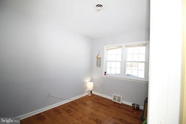 a view of a room with a window