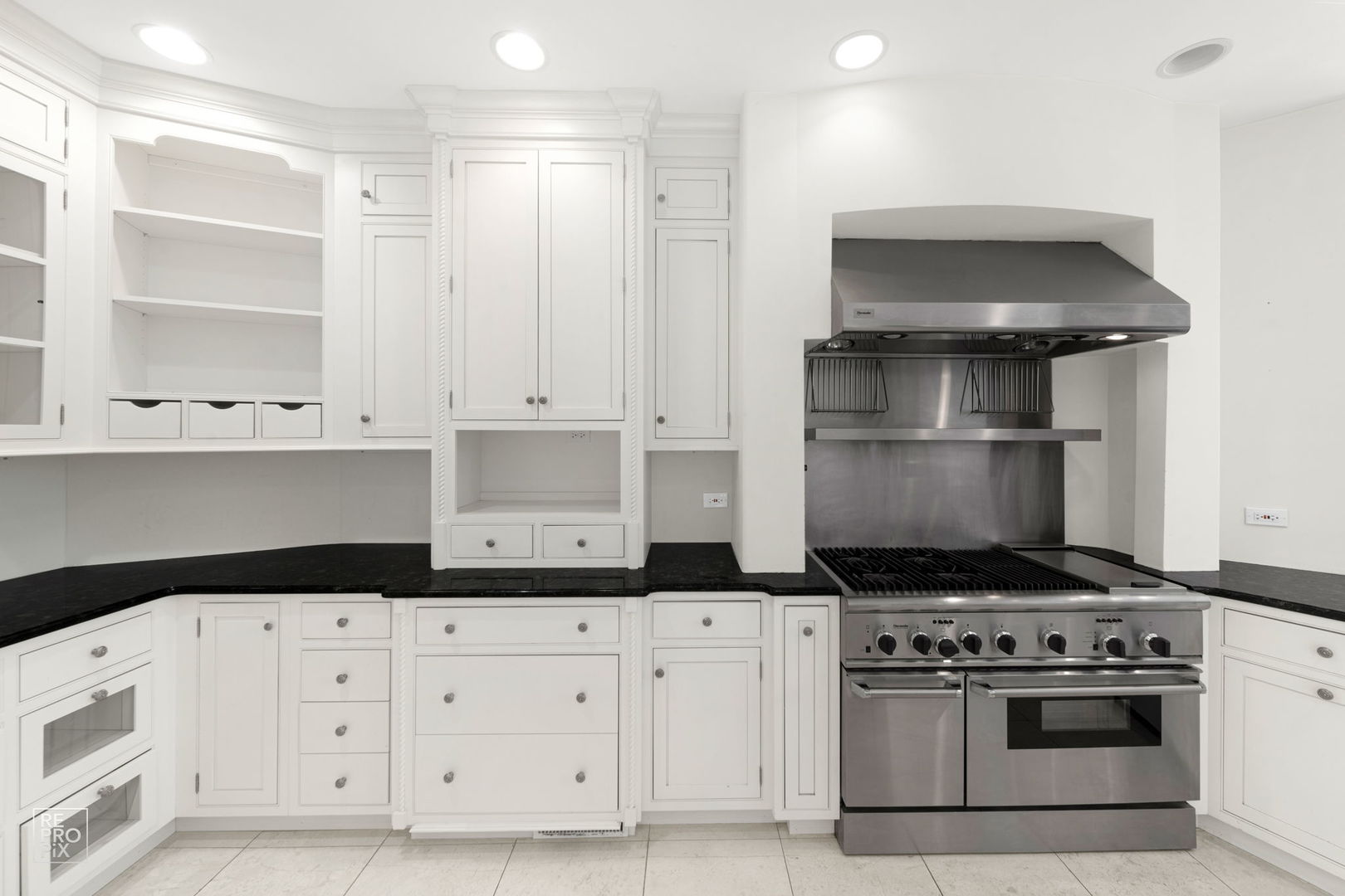 355 Flagg Court Hinsdale, IL 60521 - Photo 14 of 53 a kitchen with white cabinets and appliances