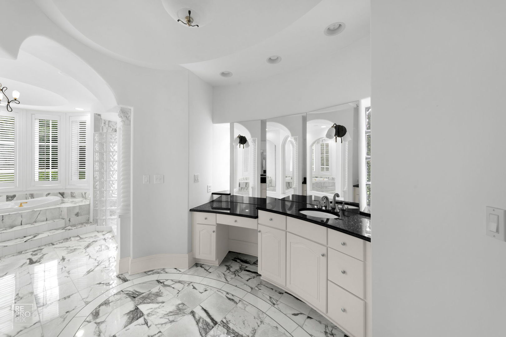 355 Flagg Court Hinsdale, IL 60521 - Photo 24 of 53 a bathroom with double sink and a mirror