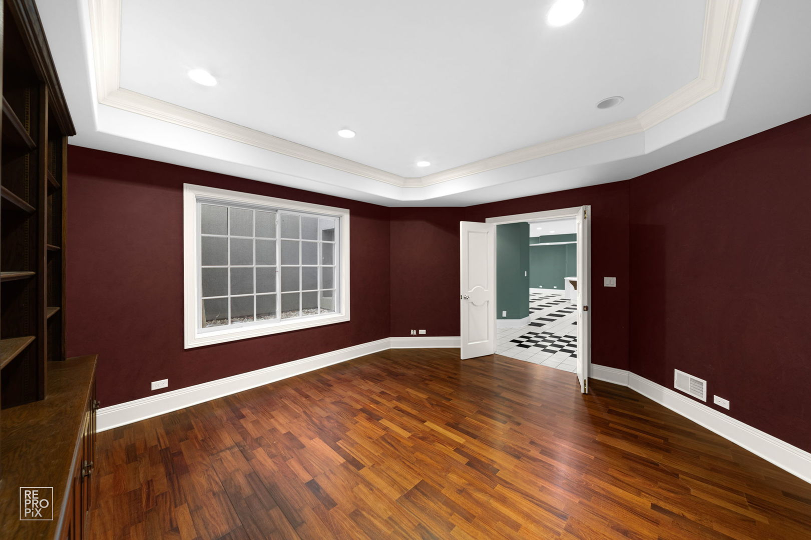 355 Flagg Court Hinsdale, IL 60521 - Photo 42 of 53 a view of an empty room with wooden floor and a window