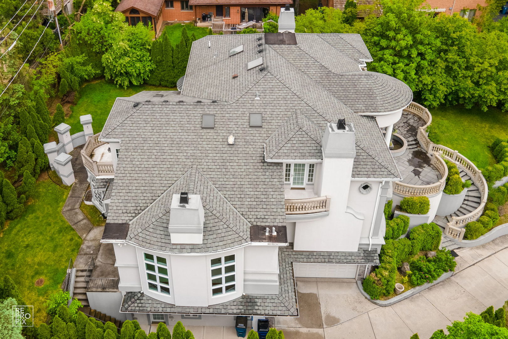 355 Flagg Court Hinsdale, IL 60521 - Photo 52 of 53 an aerial view of a house with a garden and a car parked