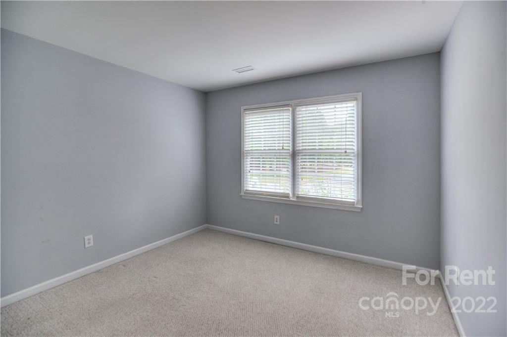 2857 Windsor Chase Drive Matthews, NC 28105 - Photo 23 of 46 an empty room with a window