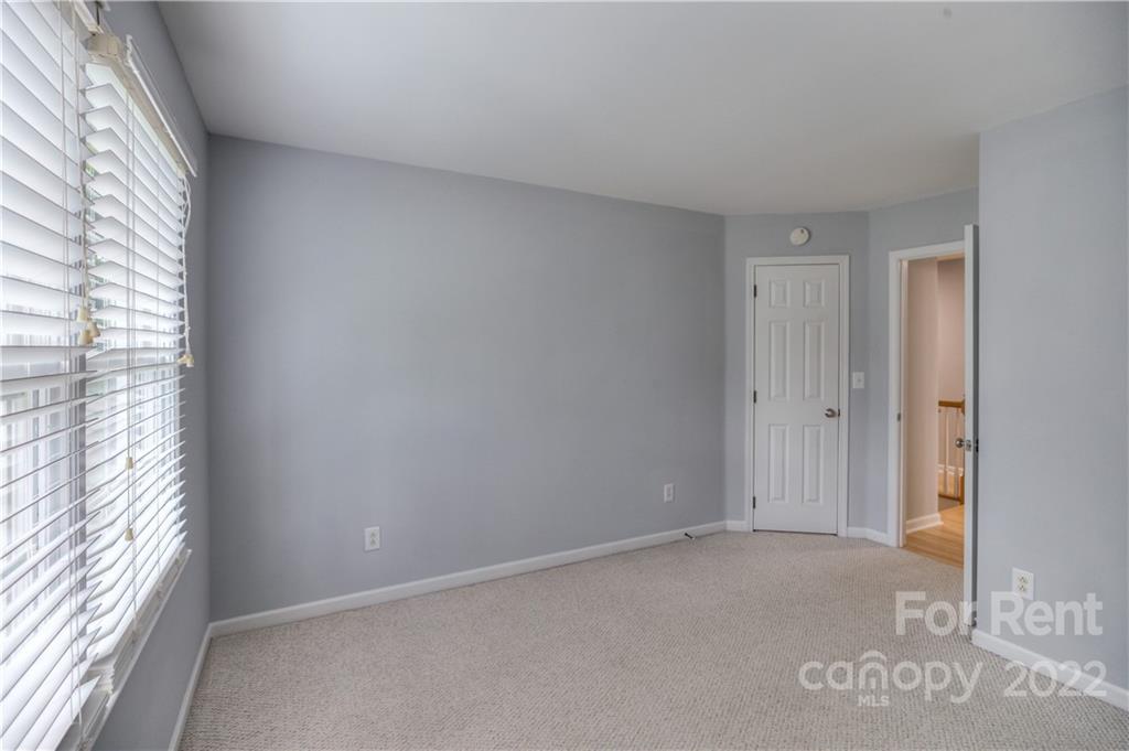 2857 Windsor Chase Drive Matthews, NC 28105 - Photo 24 of 46 a view of an empty room and window