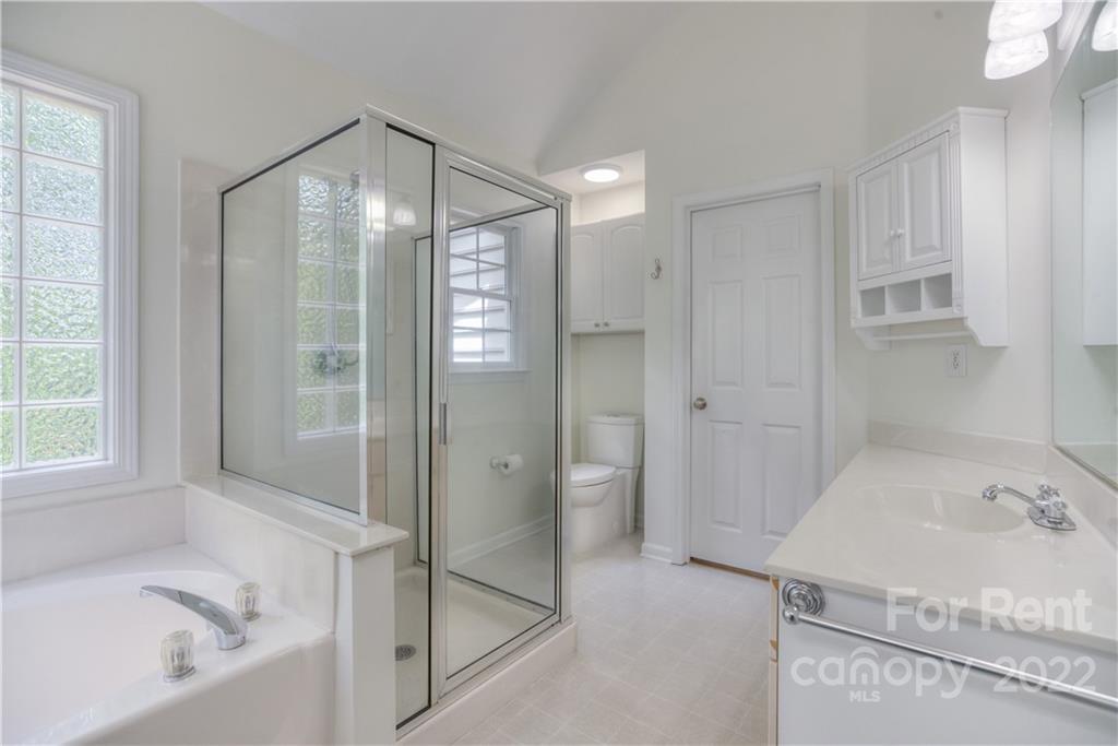 2857 Windsor Chase Drive Matthews, NC 28105 - Photo 34 of 46 a bathroom with a bathtub and a shower