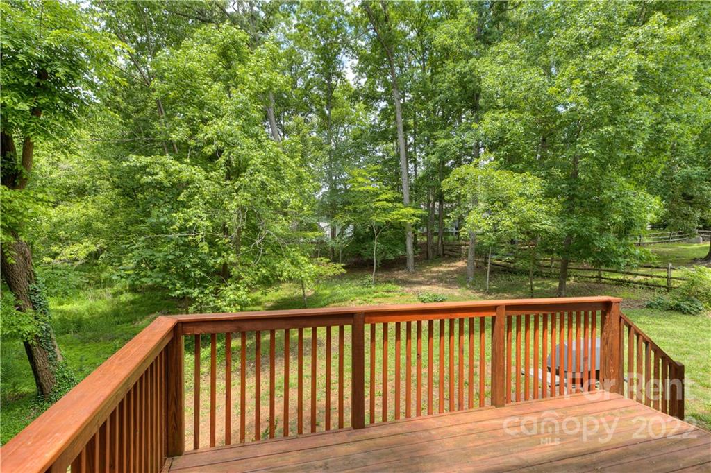 2857 Windsor Chase Drive Matthews, NC 28105 - Photo 43 of 46 a balcony with trees in front of it