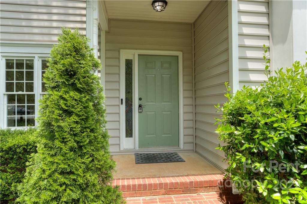 2857 Windsor Chase Drive Matthews, NC 28105 - Photo 6 of 46 a view of entrance door of the house