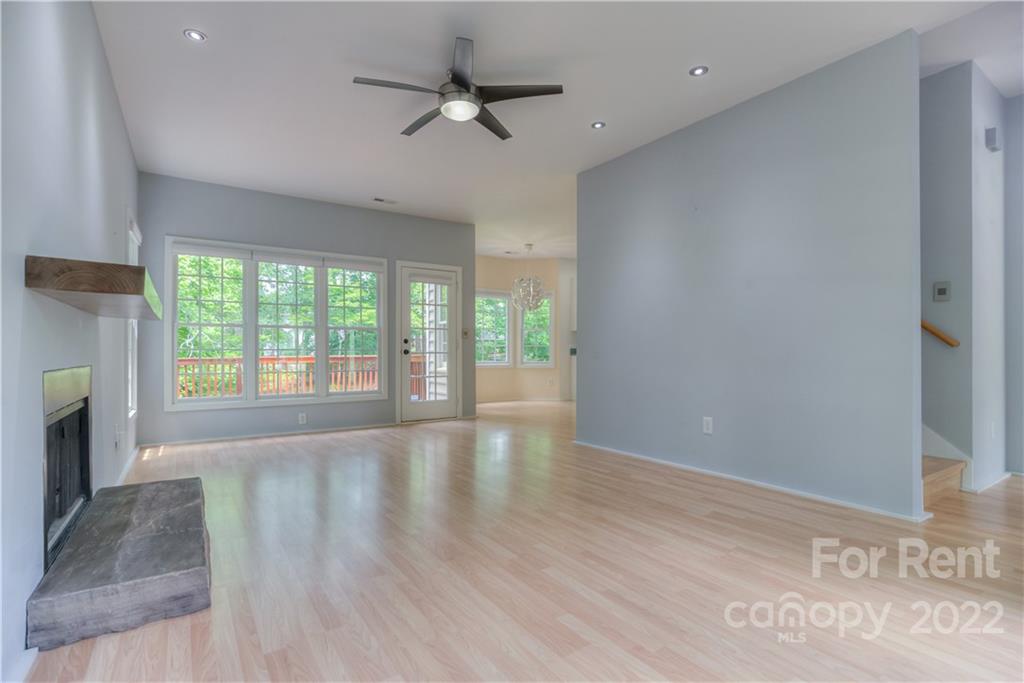 2857 Windsor Chase Drive Matthews, NC 28105 - Photo 10 of 46 wooden floor in an empty room with a window