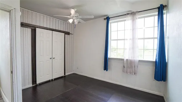 an empty room with windows