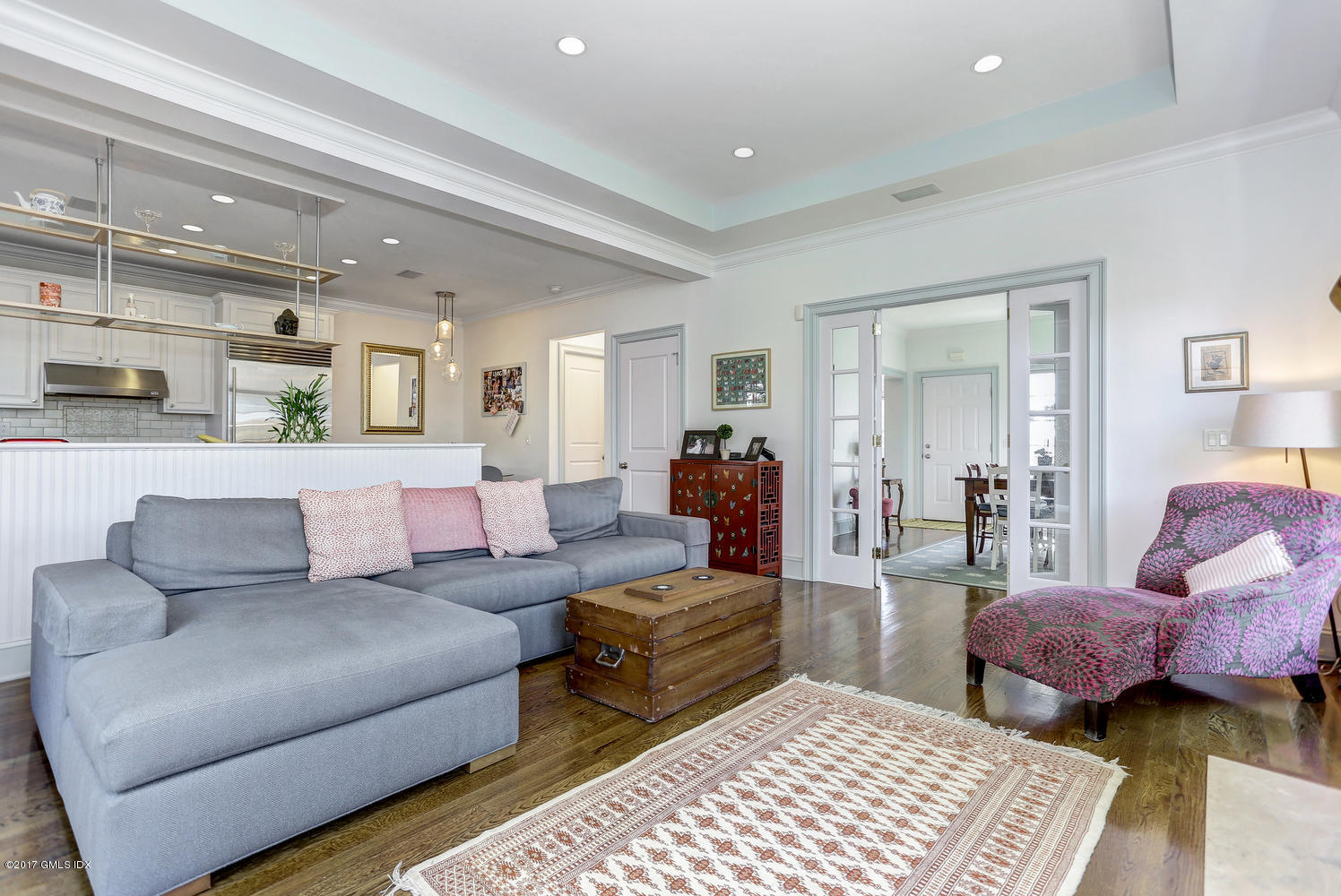44 Valley Road, Unit B Cos Cob, CT 06807 - Photo 9 of 27 a living room with furniture and a rug