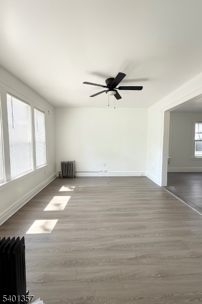237 Wainwright Street Newark, NJ 07112 - Photo 3 of 5 a view of a room with wooden floor and window