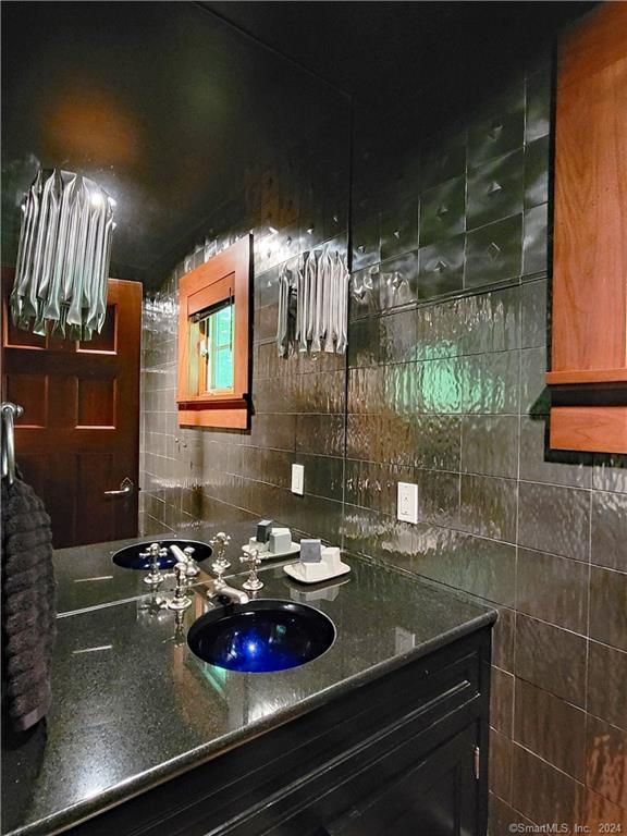 22 Ketcham Road Ridgefield, CT 06877 - Photo 19 of 40 a kitchen with a sink and a stove